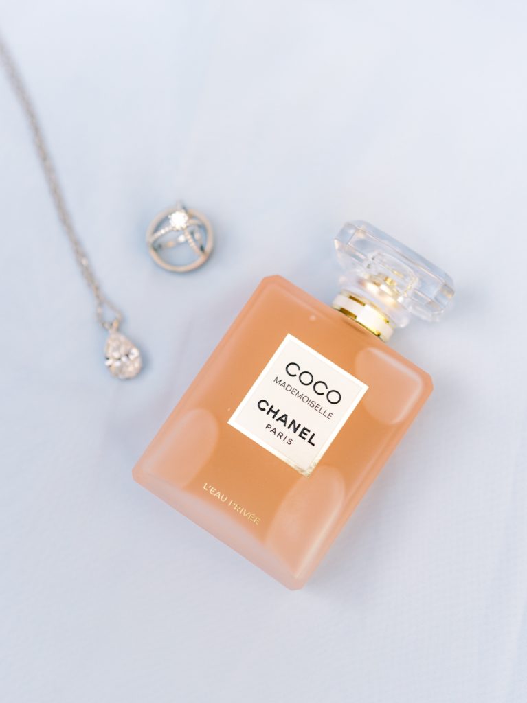 Coco Chanel perfume and diamond necklace and diamond engagement ring