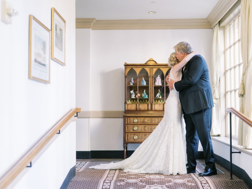 First look between the bride and her Dad at the Williamsburg Inn in Williamsburg Virginia