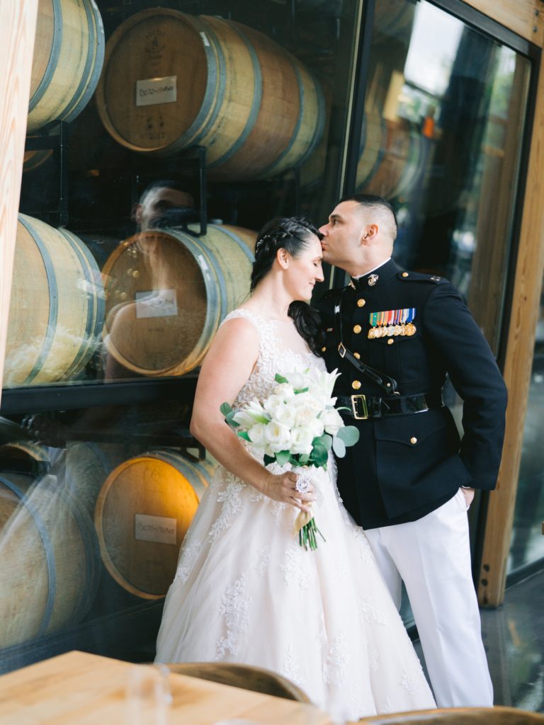bride and groom at District Winery at the Wharf in Washington DC