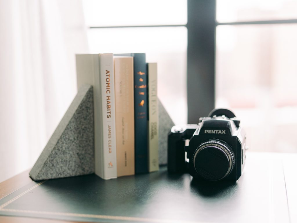 Pentax camera and books
