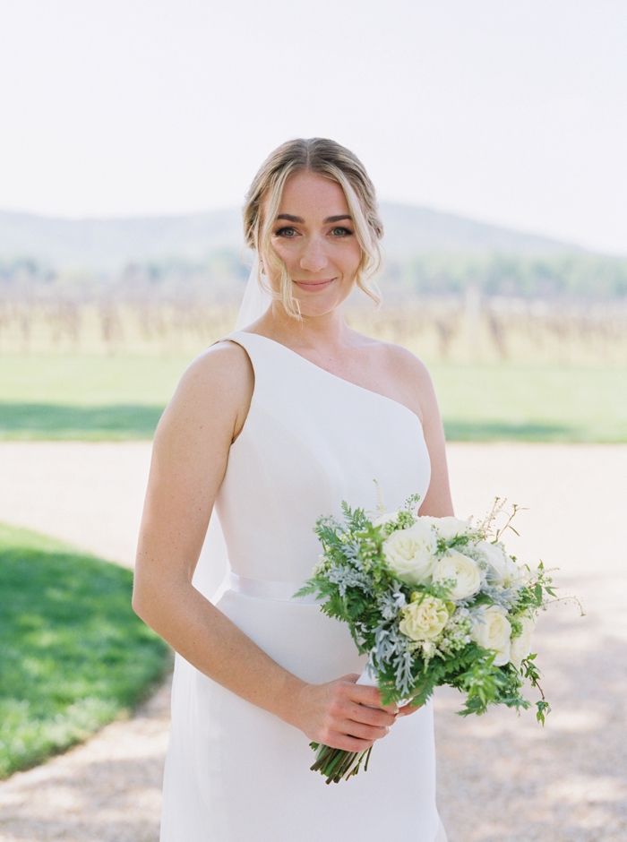bride smiling at the camera at keswick vineyards