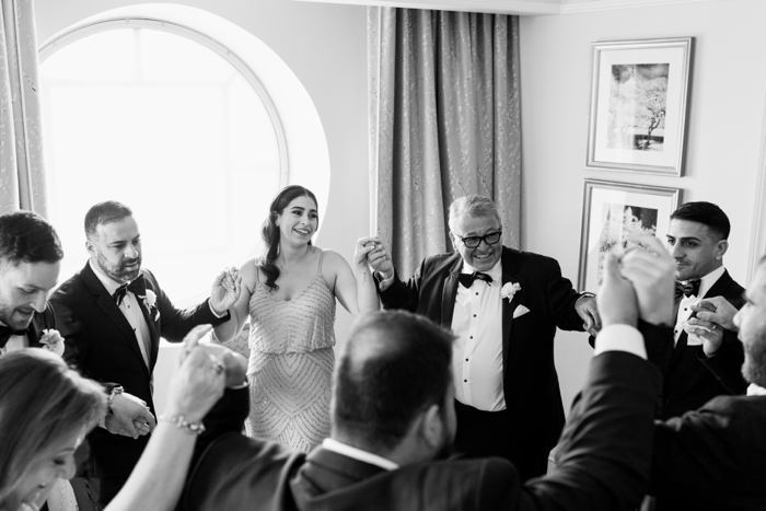 groom dancing with family at the salamander hotel in washington dc