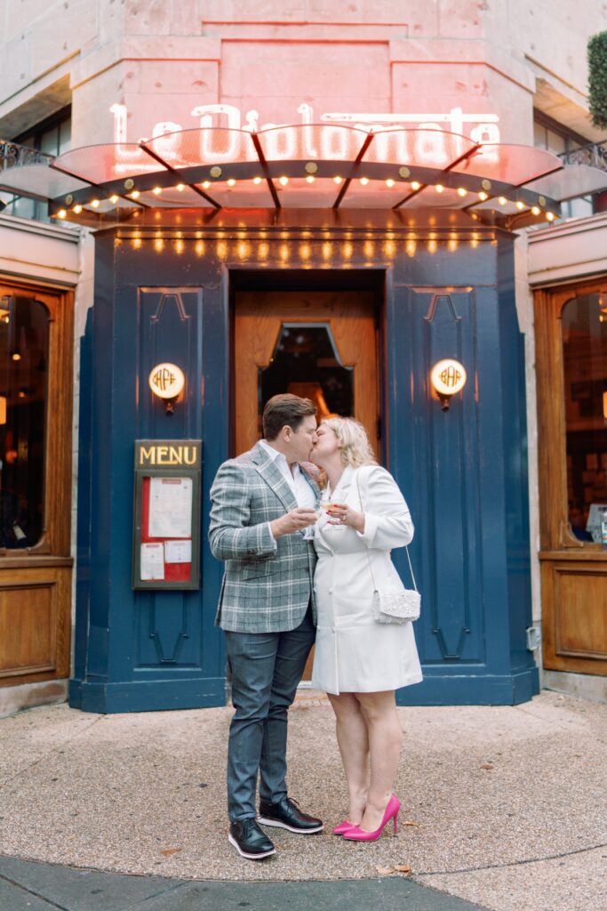 engaged couple kissing at Le Diplomate in Washington DC