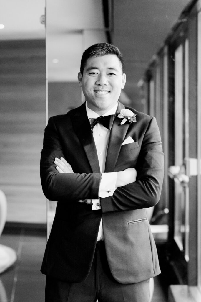 groom smiling at the camera in washington dc