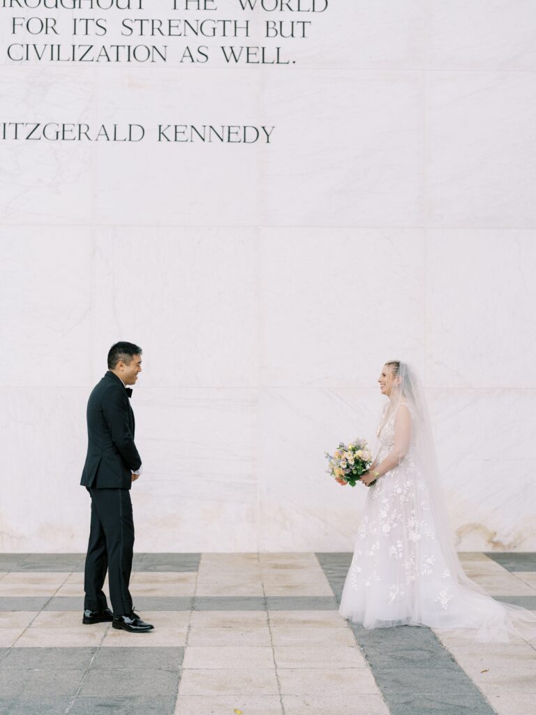 bride and groom first look at the kennedy center in washington dc