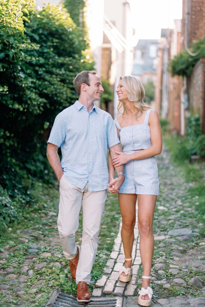 Couple walking in old town alexandria