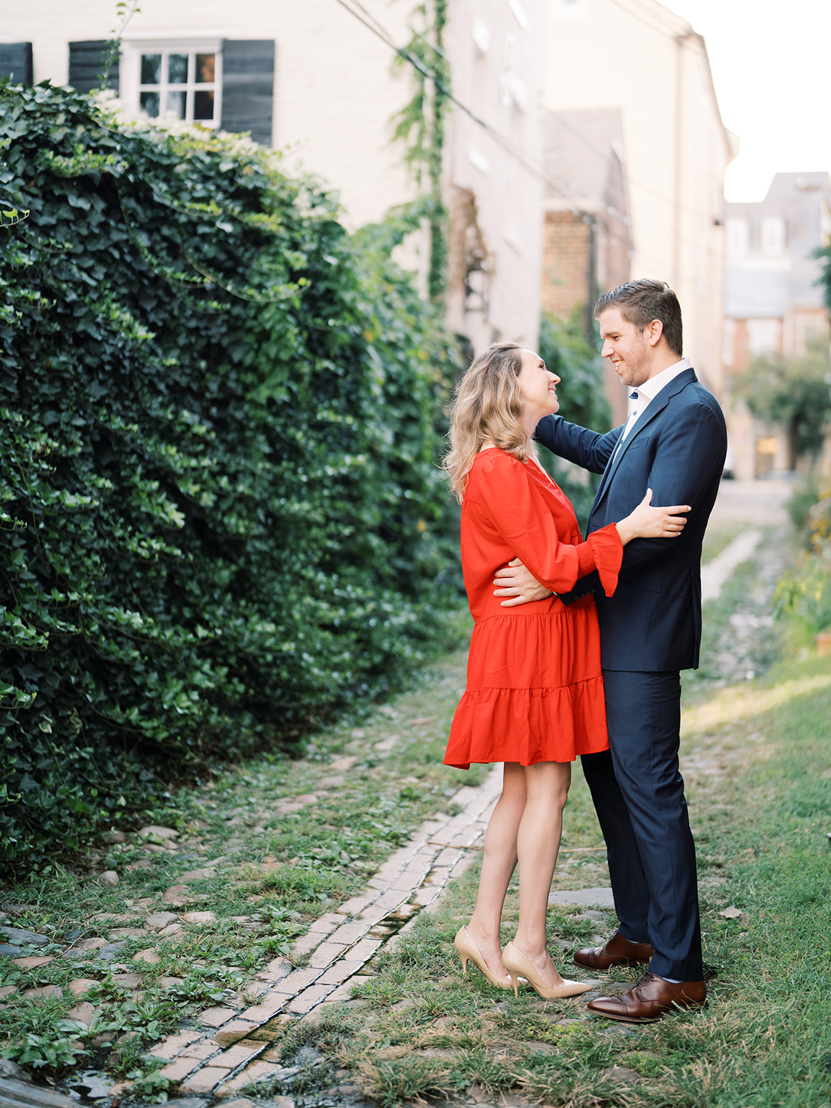 alley way bride and groom dancing in old town alexandria